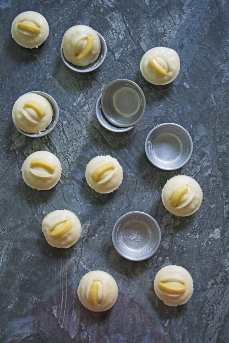 cheese puto in molds on table