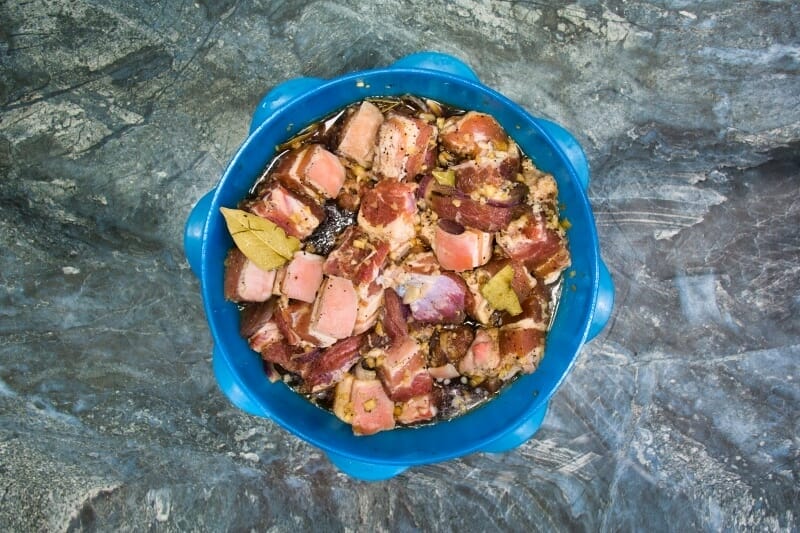 mixing pork adobo ingredients in bowl step 1