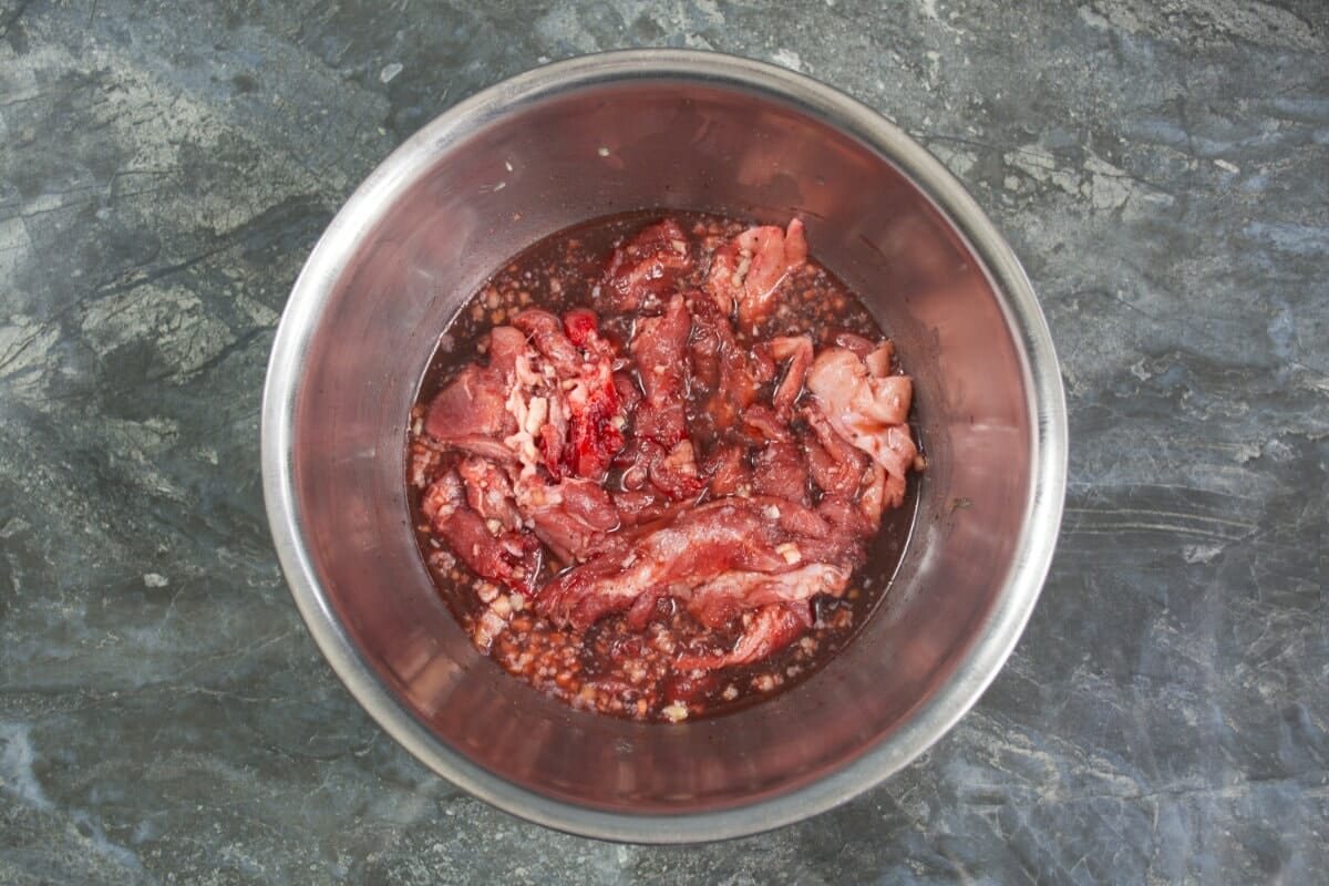 Step 1 Add Sliced Pork And Ingredients