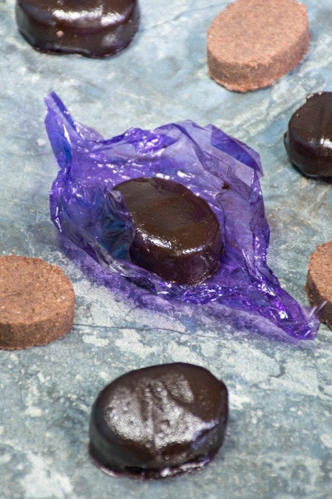Polvoron Chocolate Sweet In Paper On Table