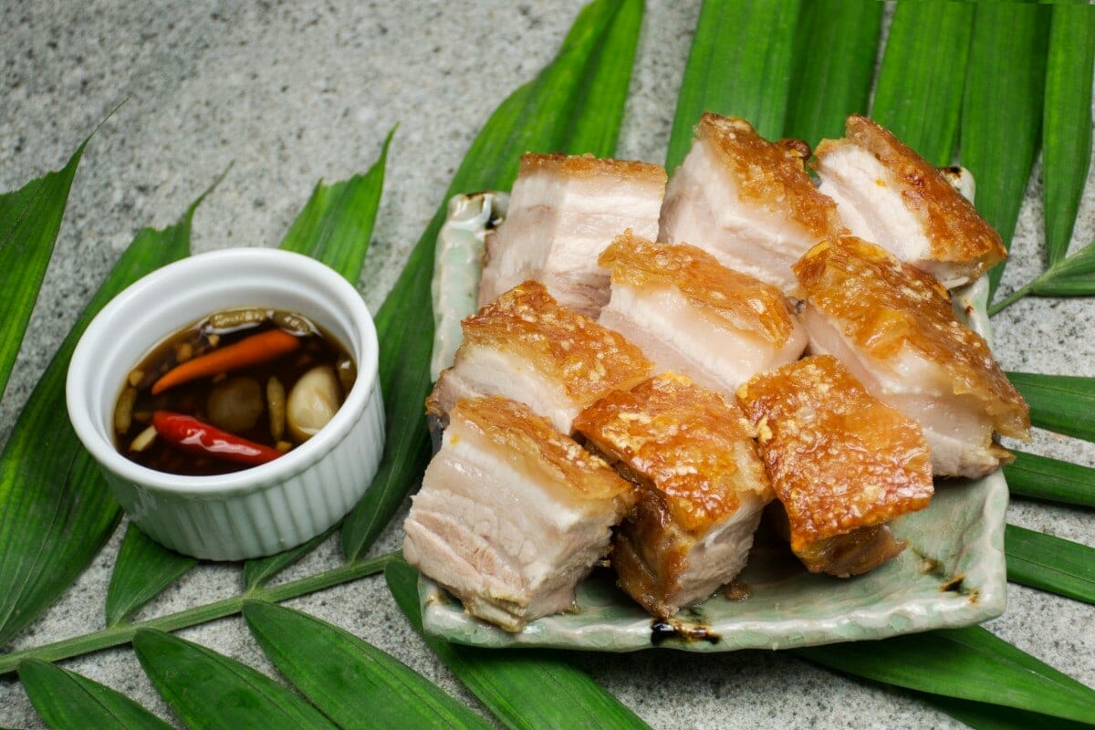 Crispy Pata With Dipping Sauce. One of the best Filipino dishes to try