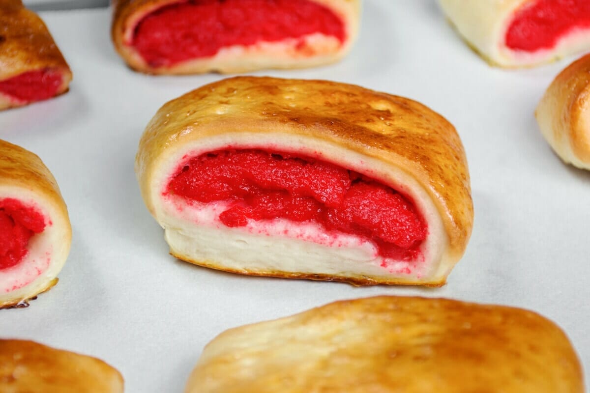 Close Up Of Baked Kalihim Bread With Red Filling