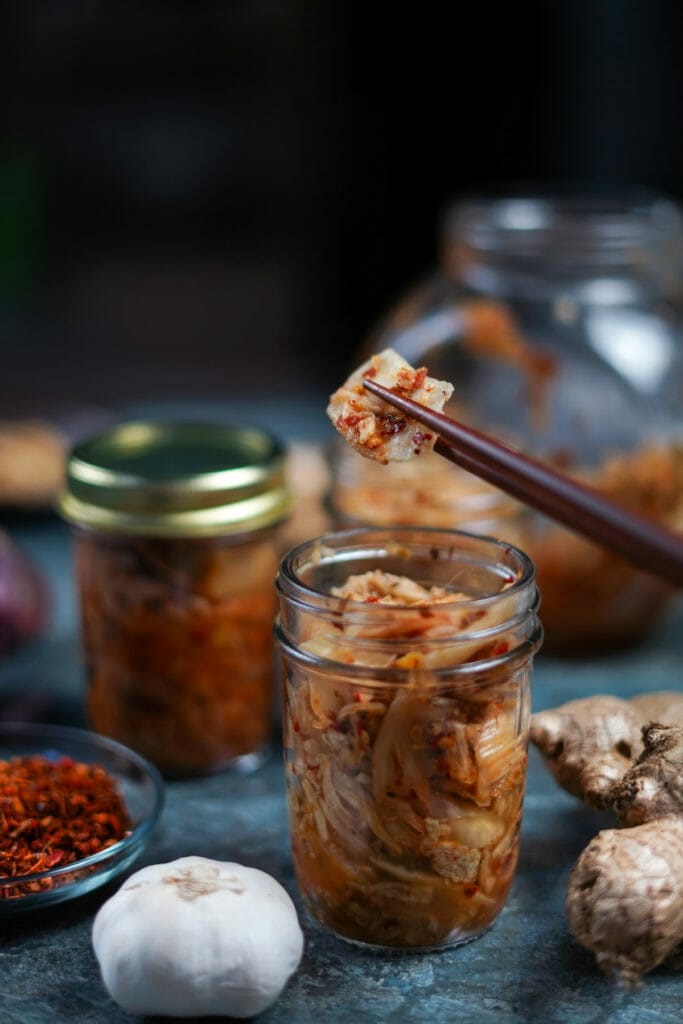 spicy kimchi vegetable dish with chopstick