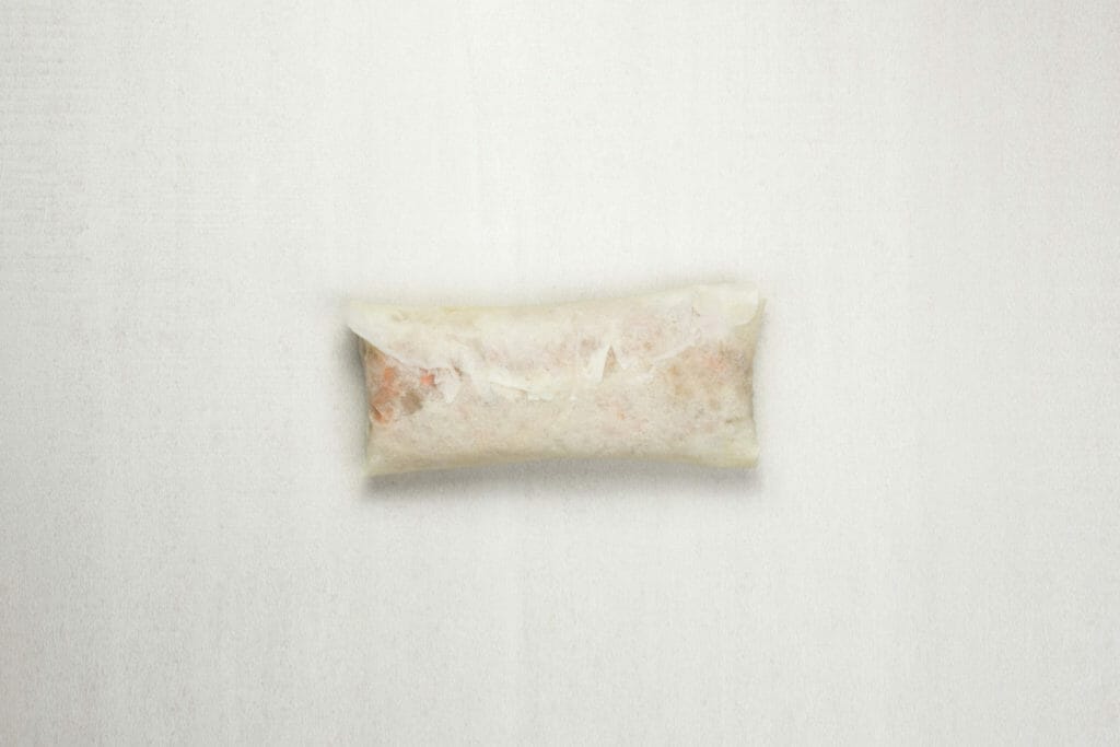 step 7 seal lumpia packet by wetting edges