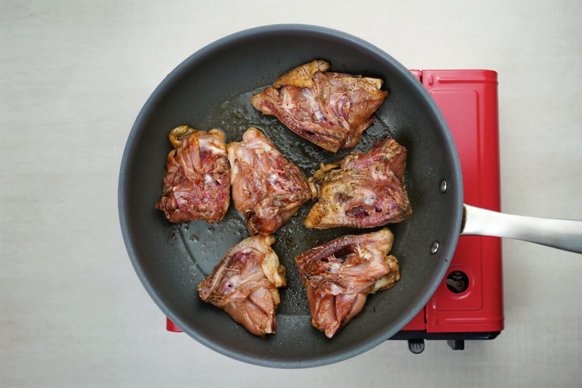 step 4 fry chicken drumsticks in pan