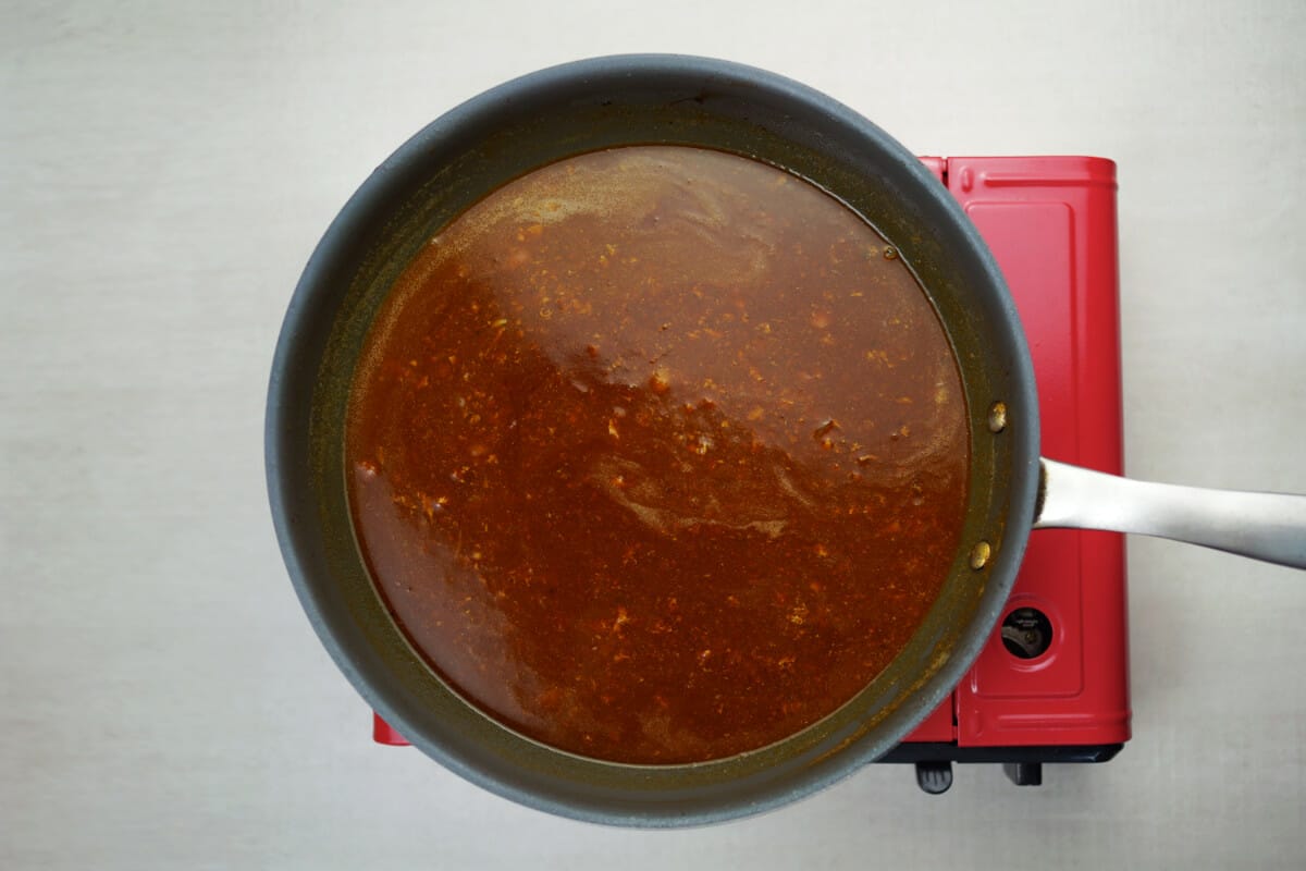 step 8 add broth tomato