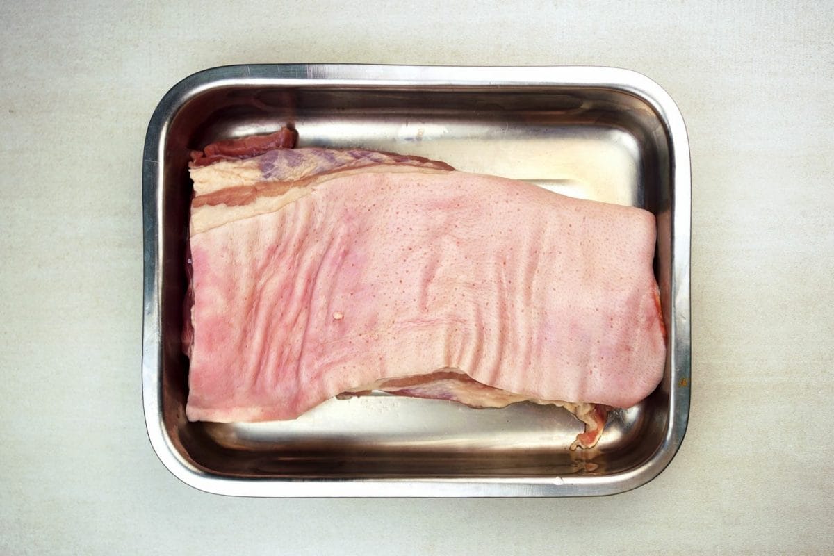 Step 1 Puncturing pork belly skin